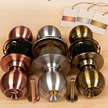 Illustration of round door lock sets in copper, satin nickel and antique brass finishes with matching colour tags